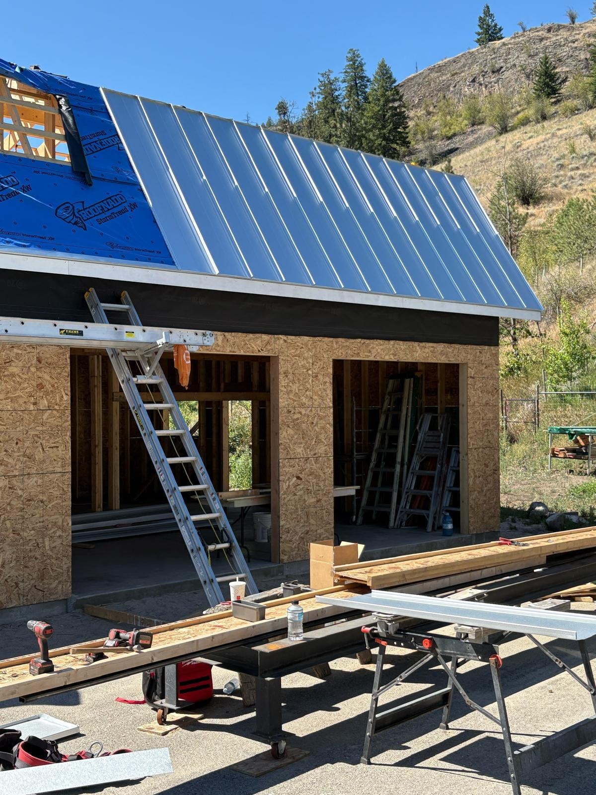 Metal roofing panels installation close up