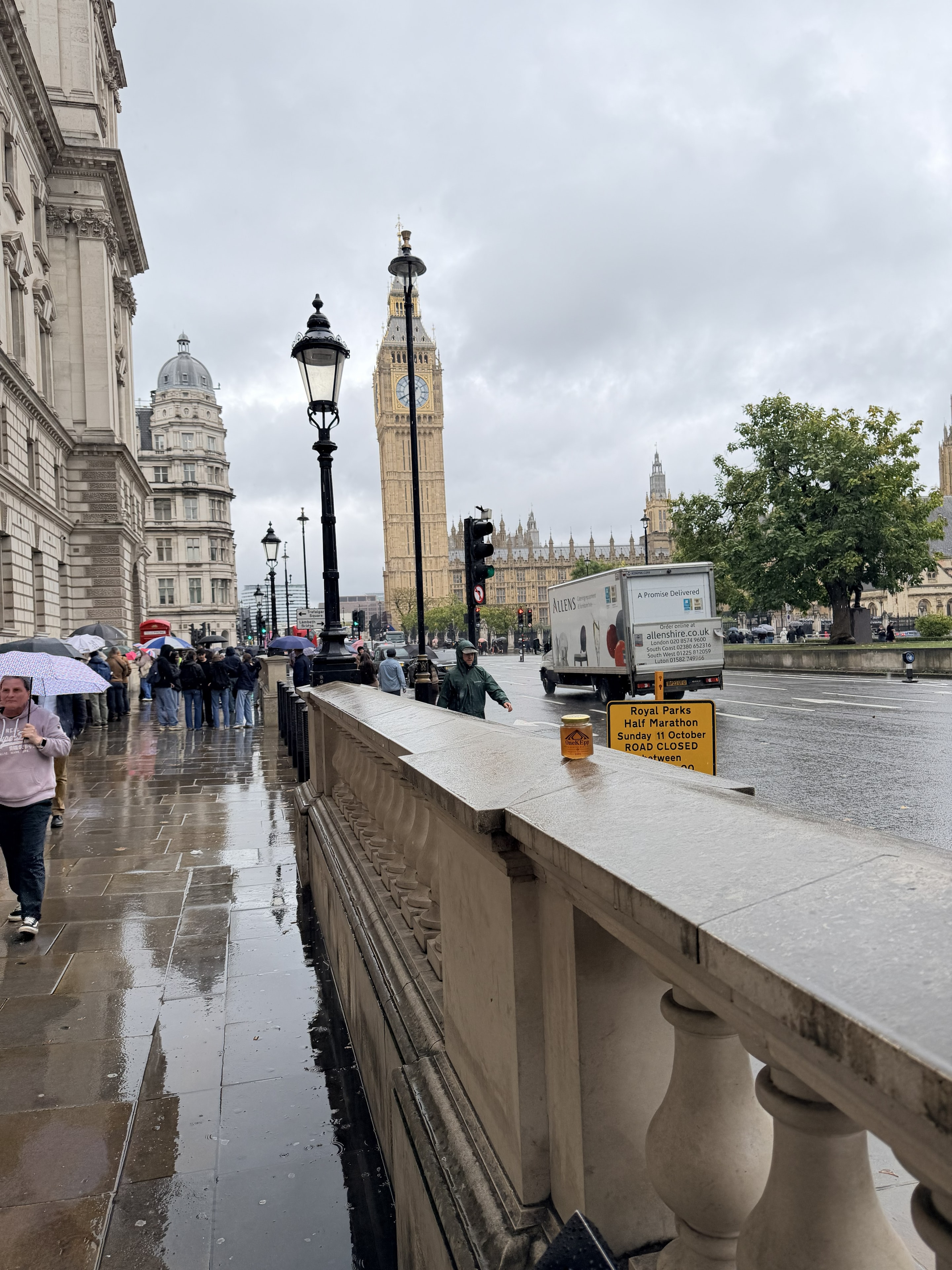 OneKEpp honey jar on a ledge near Big Ben and the Houses of Parliament in London
